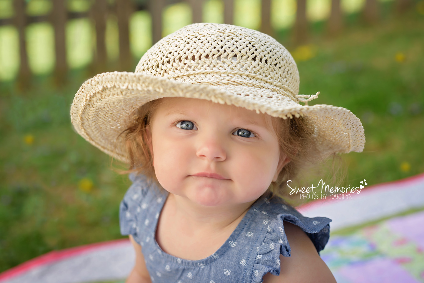 one year old in sunhat