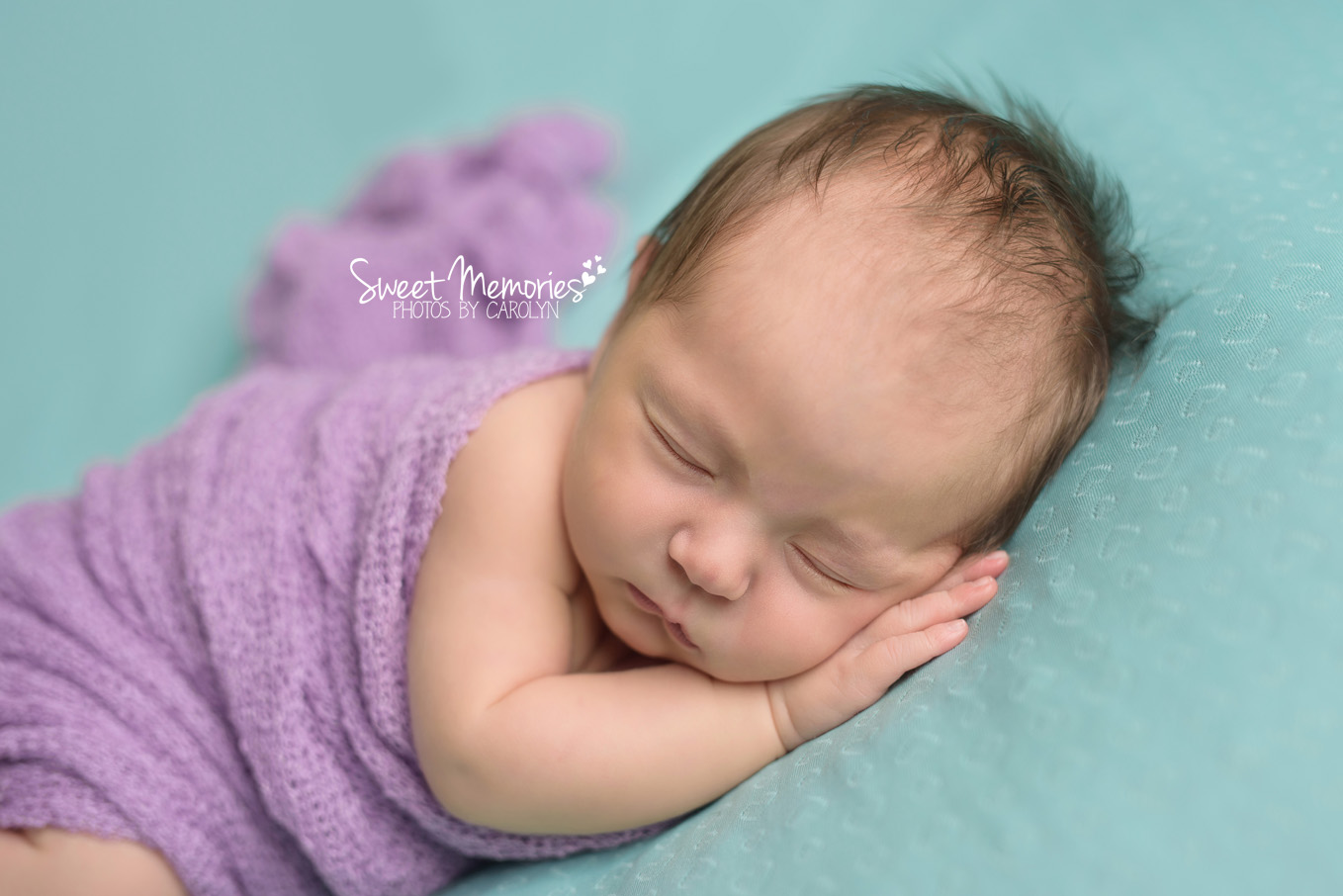 Sweet Memories Photos by Carolyn | Doylestown PA | Bucks County Montgomery County Newborn Infant Baby Photographer | newborn baby girl with head on hand | mint and purple