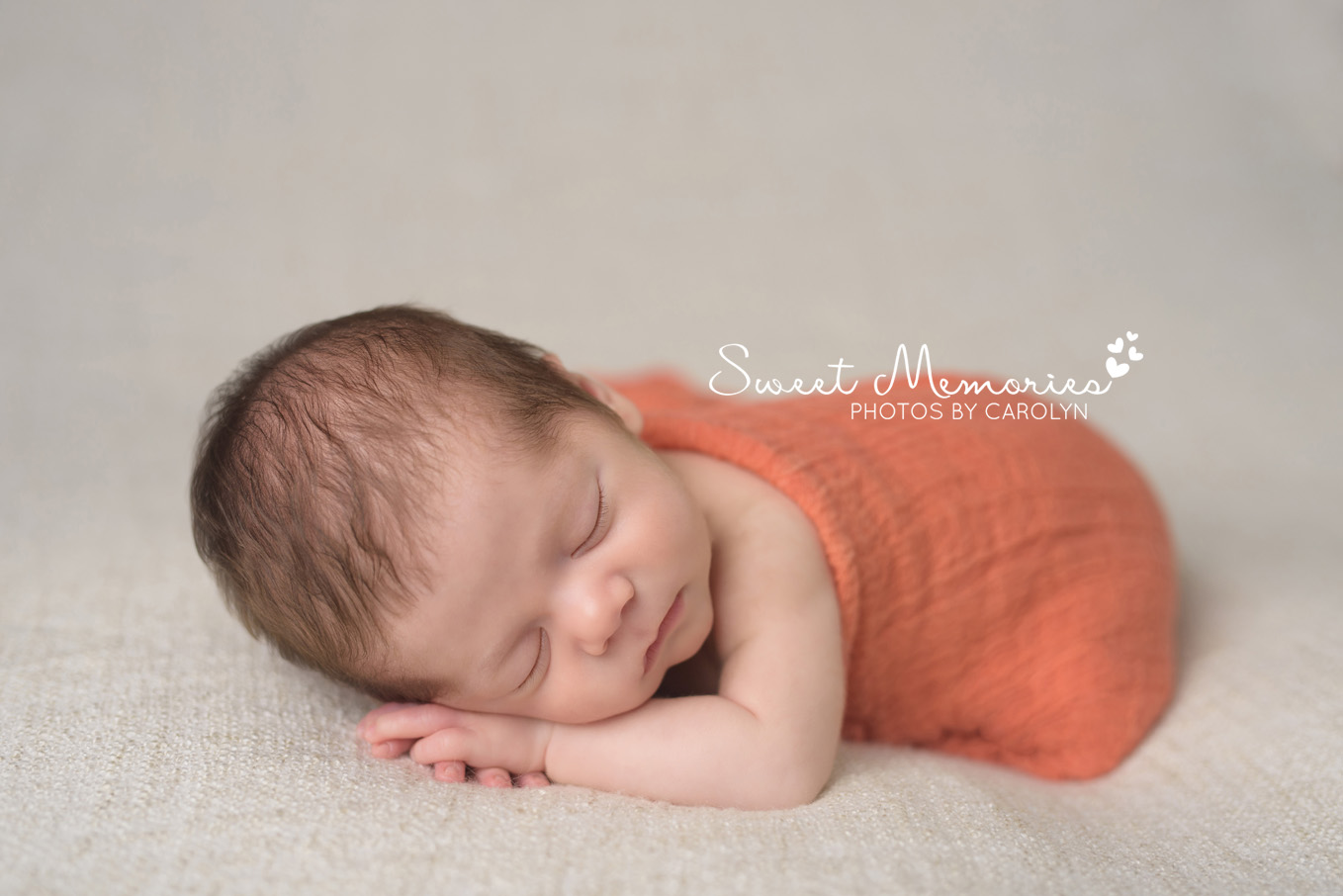 Sweet Memories Photos by Carolyn | Plymouth Meeting PA | Bucks County Montgomery County Newborn Infant Baby Photographer | newborn baby boy sleeping in orange wrap
