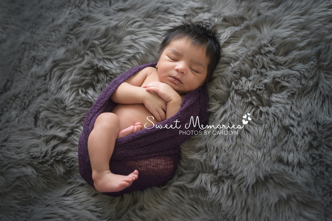 Sweet Memories Photos by Carolyn | Newtown PA | Bucks County Montgomery County Newborn Infant Baby Photographer | Indian newborn baby girl swaddled in purple on gray fur