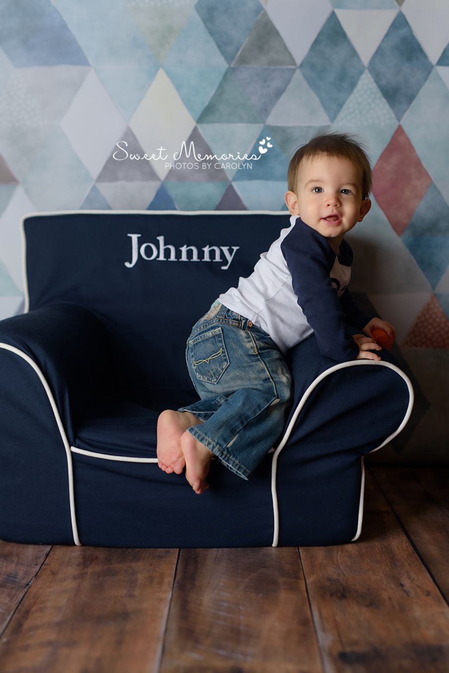 one year old boy sitting on Pottery Barn customized chair | Sweet Memories Photos by Carolyn