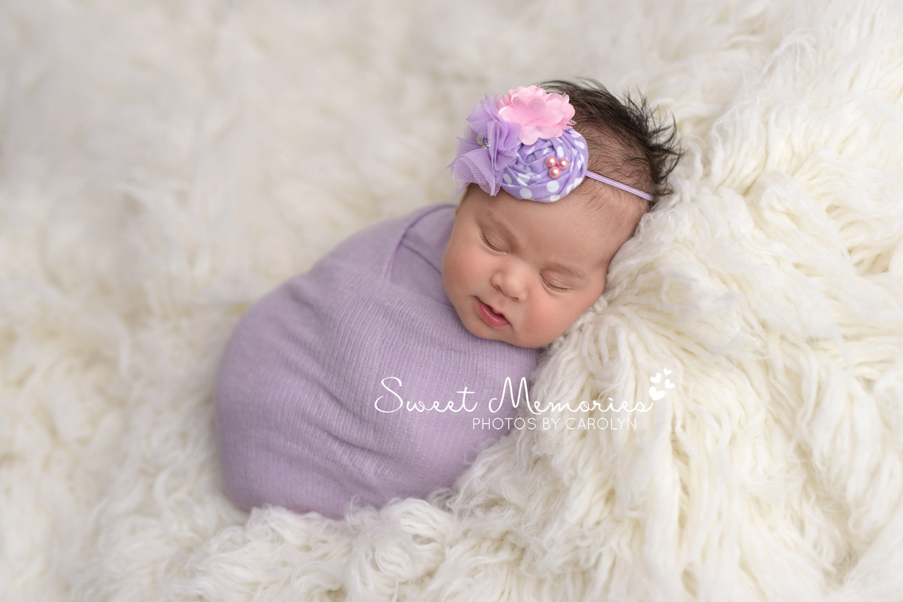 newborn baby girl swaddled pose on fur | Coopersburg newborn photographer | Sweet Memories Photos by Carolyn Quakertown Pennsylvania