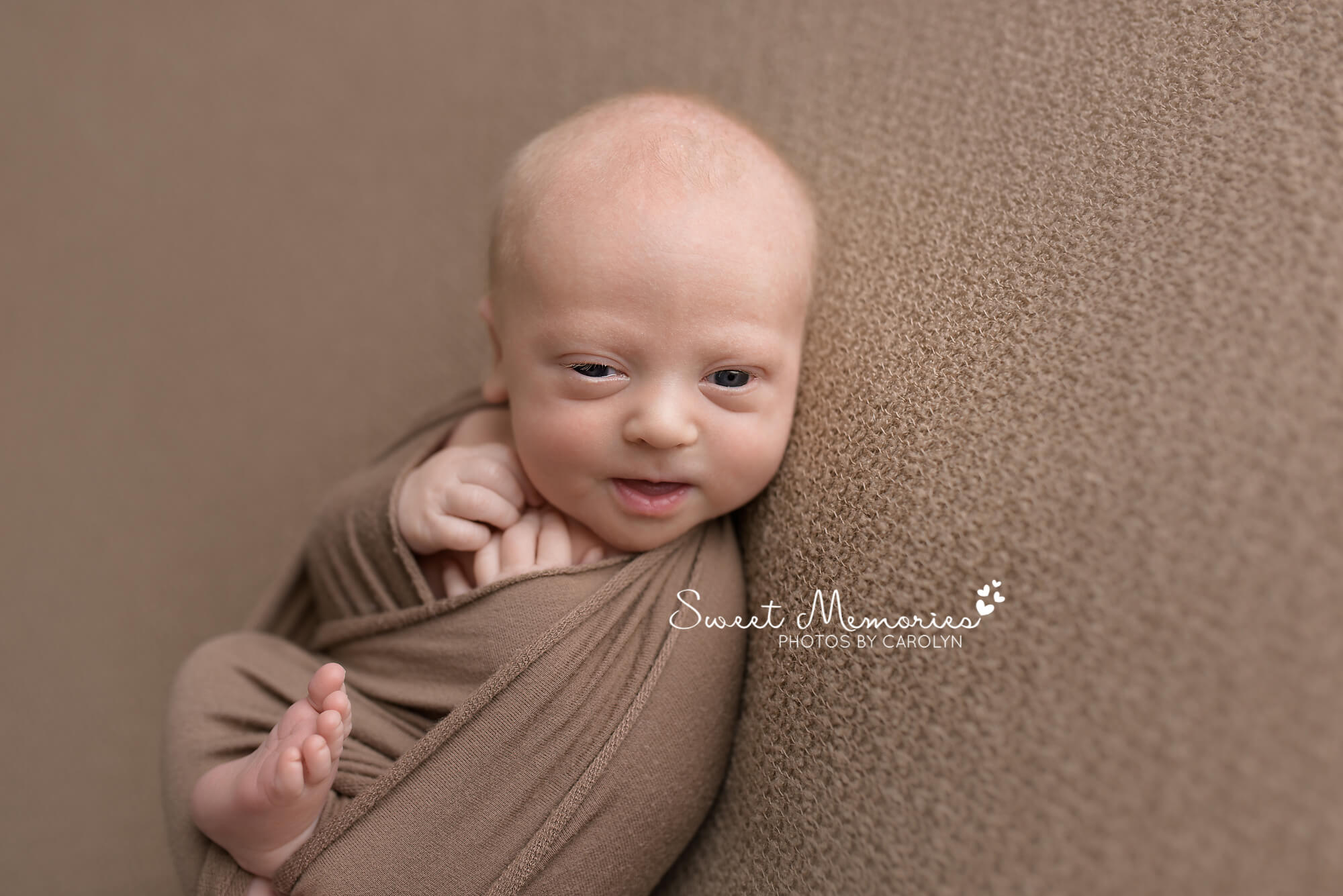 newborn baby boy swaddled in brown awake smile | Warrington, PA newborn photographer | Sweet Memories Photos by Carolyn, Quakertown Pennsylvania