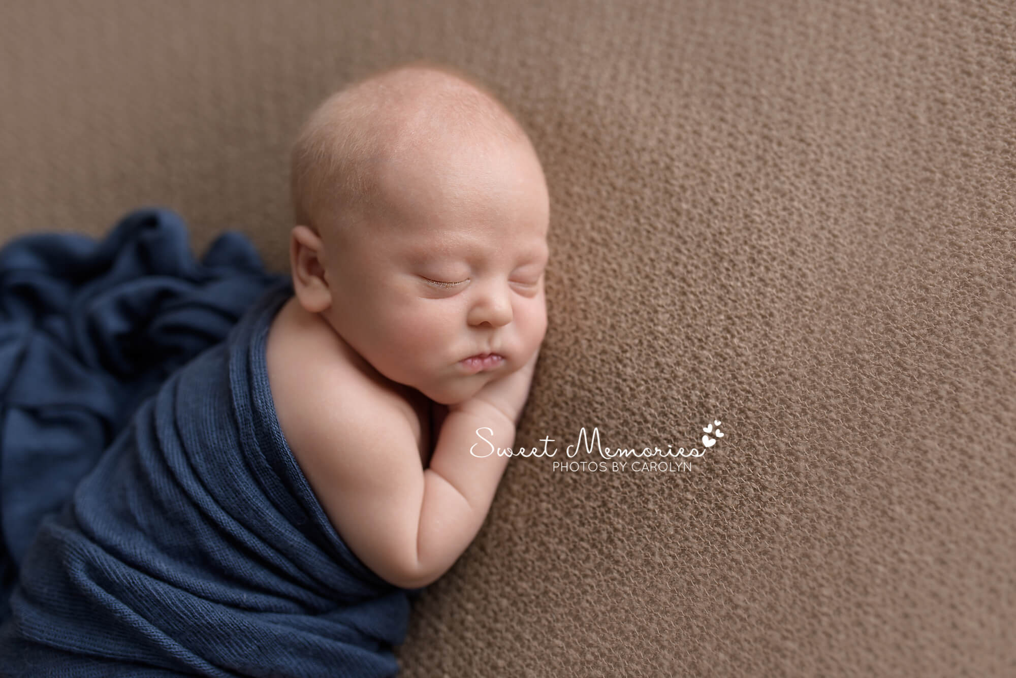 newborn baby boy on brown blanket wrapped in blue side profile | Warrington, PA newborn photographer | Sweet Memories Photos by Carolyn, Quakertown Pennsylvania