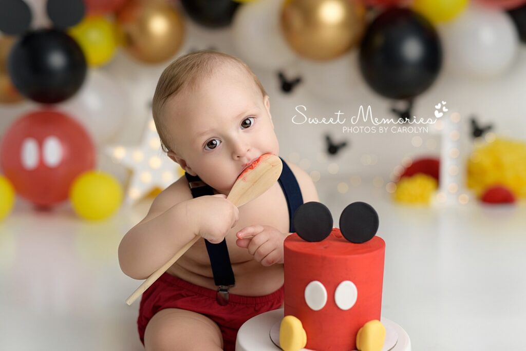 One year old boy Mickey Mouse Cake Smash | Hutto, Texas cake smash photography | Sweet Memories Photos by Carolyn, Quakertown Pennsylvania