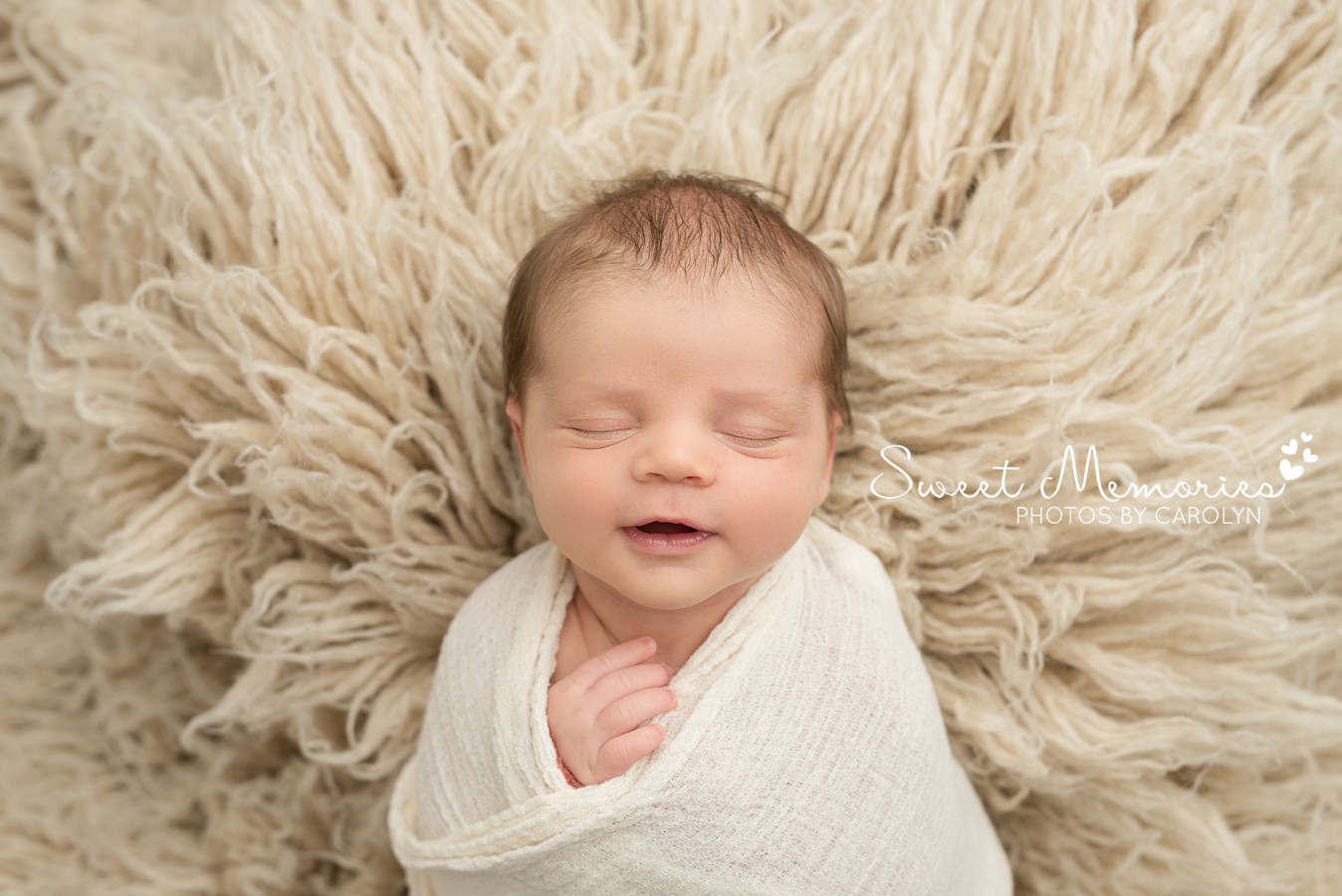 Wrapped Newborn Boy in cream smile Newborn Photography | Austin, Texas Newborn Photographer | Sweet Memories Photos by Carolyn