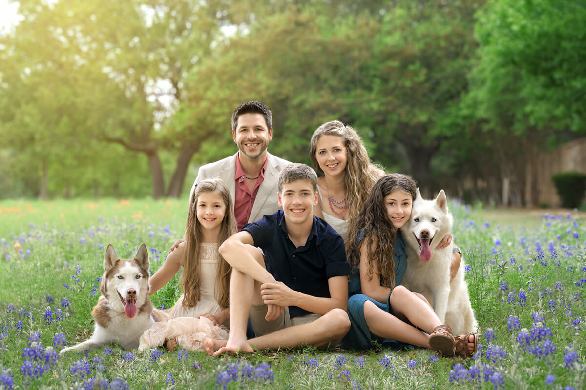 Family with three kids and two dogs