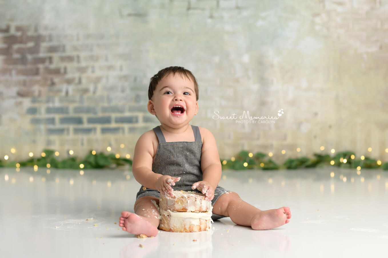 one year old boy smiling with cake | first birthday photography Austin TX | Sweet Memories Photos by Carolyn