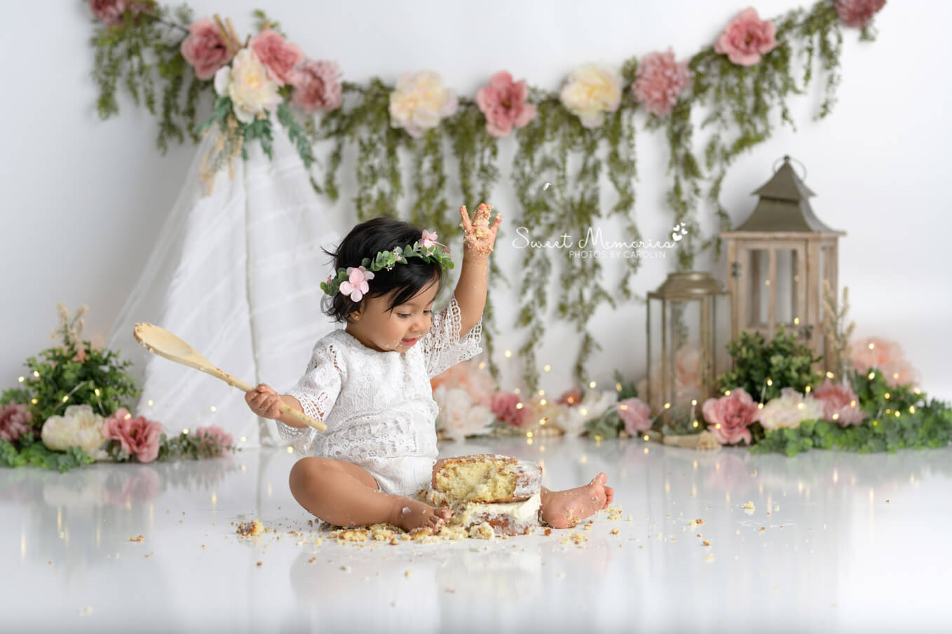 baby girl boho floral first birthday with smash cake | Austin cake smash photography