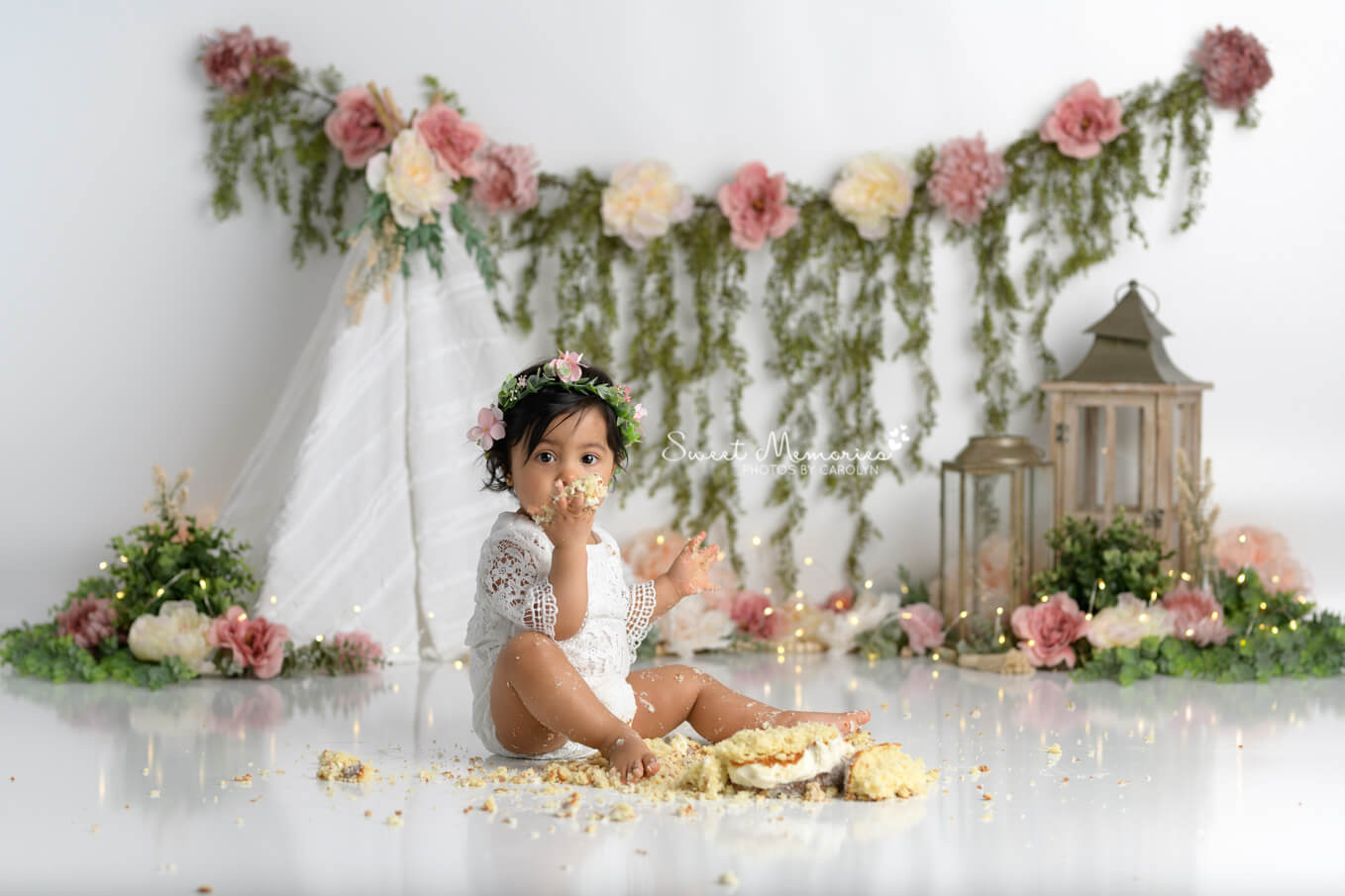 baby girl boho floral first birthday with smashed cake | Austin cake smash photography