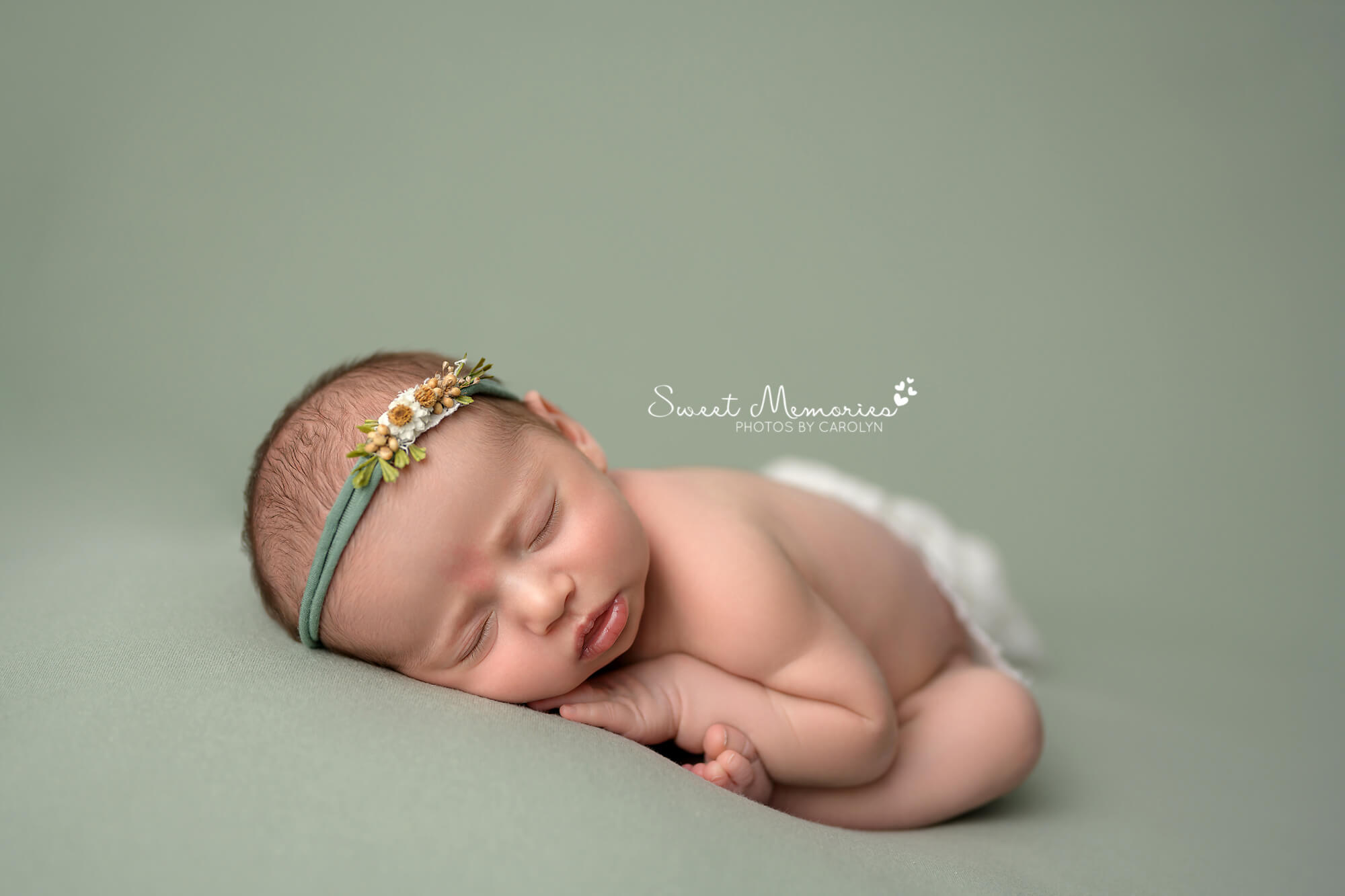 Baby girl sleeping taco pose